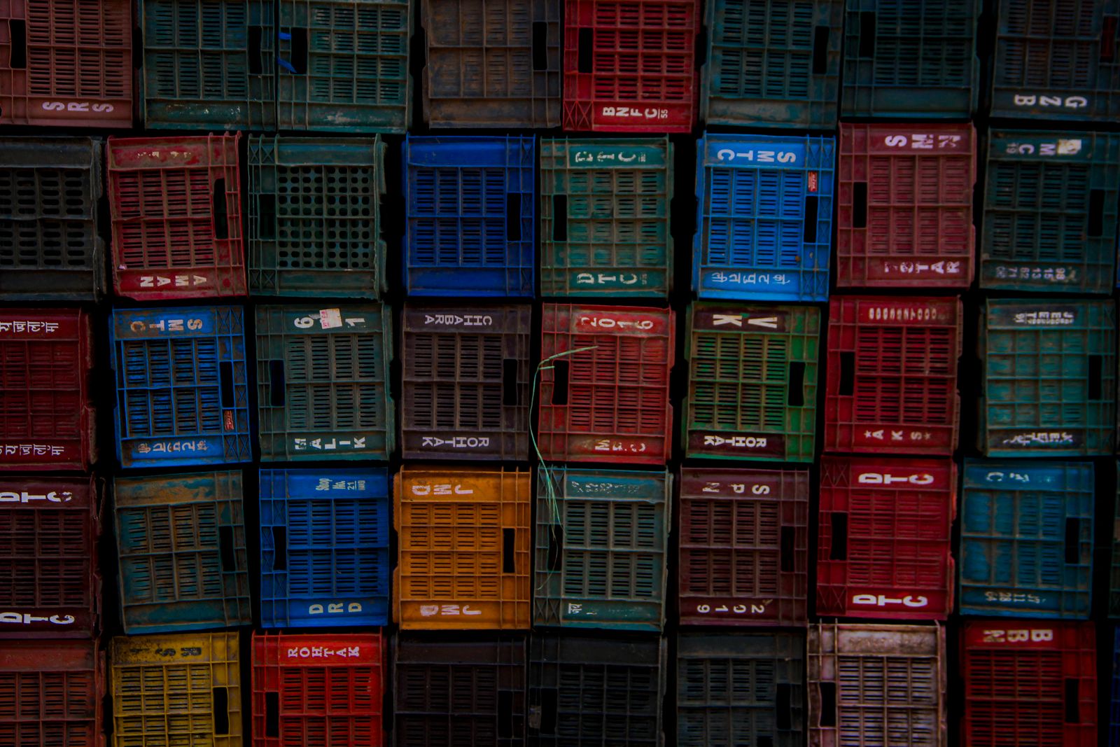Stacked colourful plastic crates